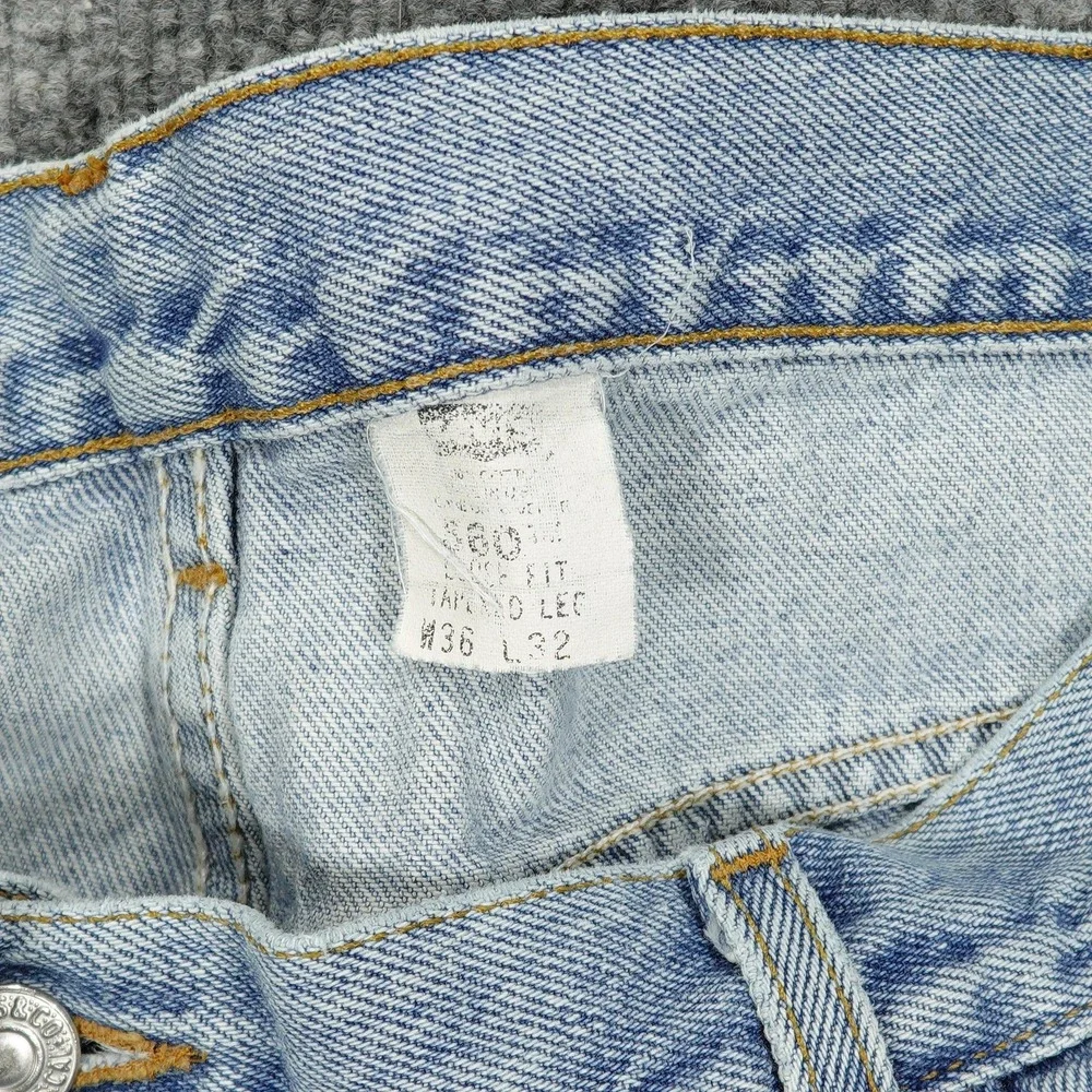 Vintage Levis 560 Jeans Mens 36x26 Light Wash Blue Relaxed Tapered Raw Hem